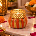 Colorful fabric tea light holders glowing for Diwali